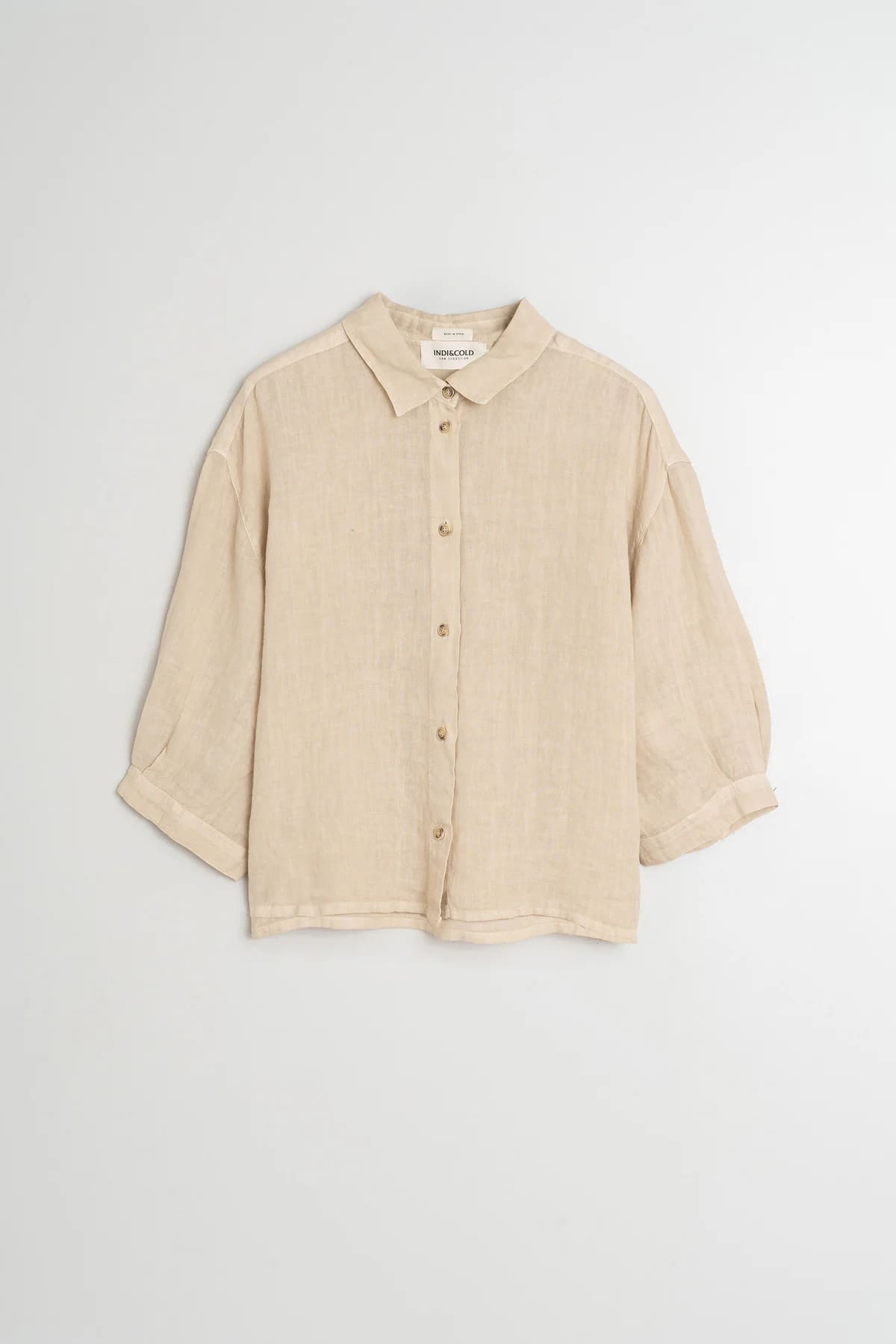 Flat lay of linen short sleeve shirt.