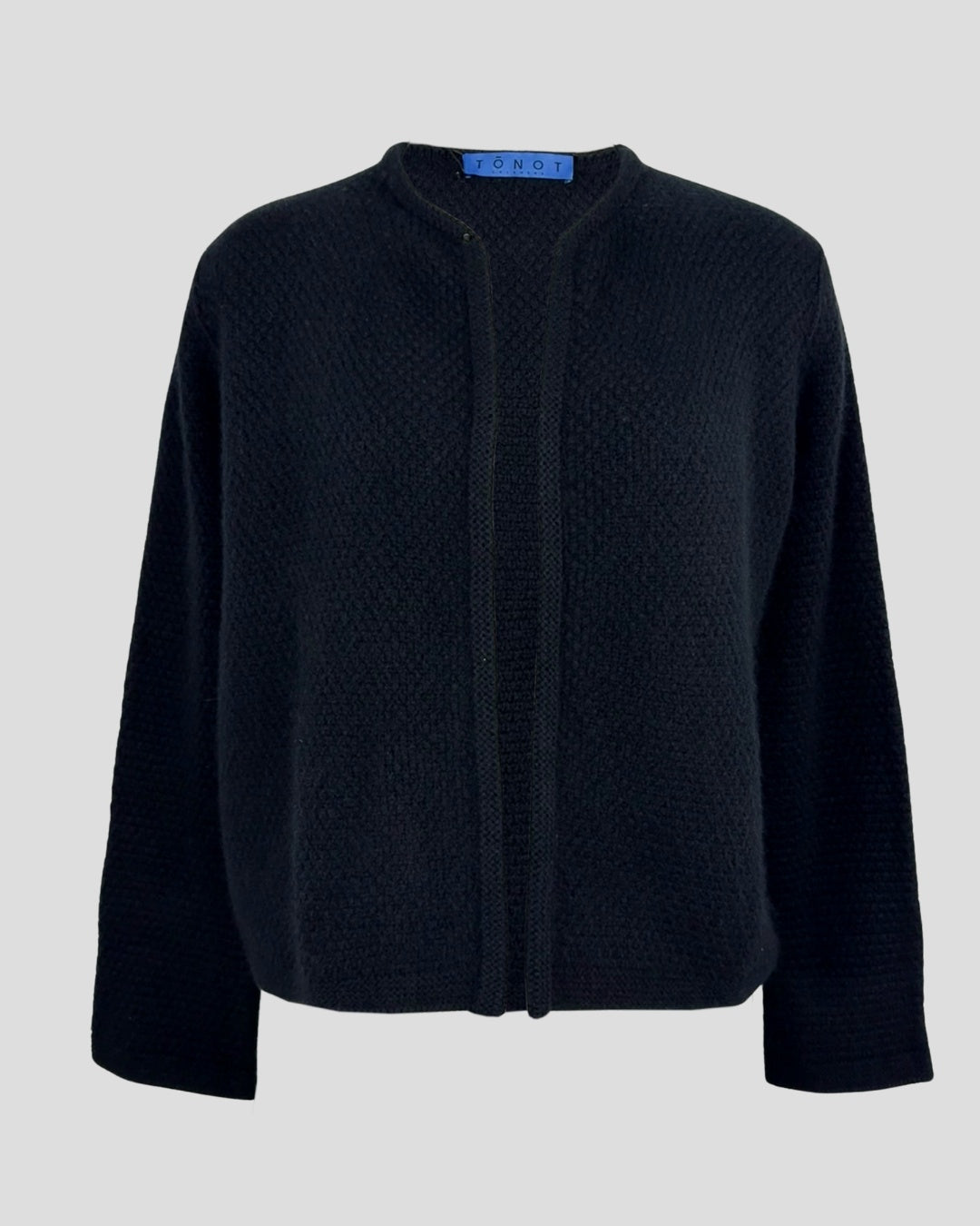 Black cashmere cardigan with moss stitch detail, no buttons open front